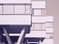 Modern white office buildings on angled supports